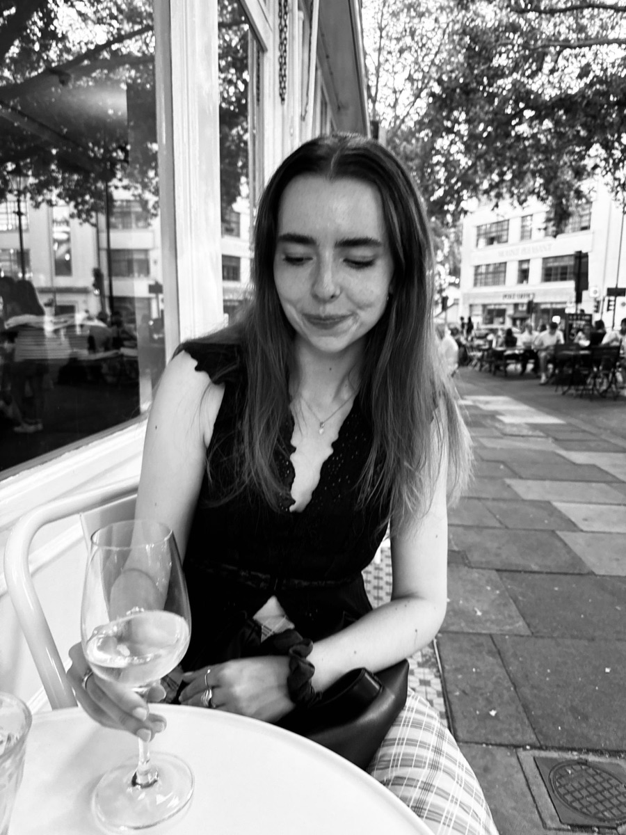 Rebecca at a café table in London